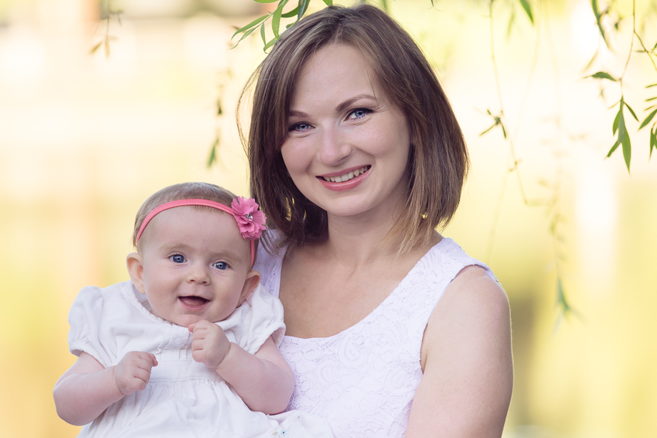 Happy baby girl with her beautiful mom