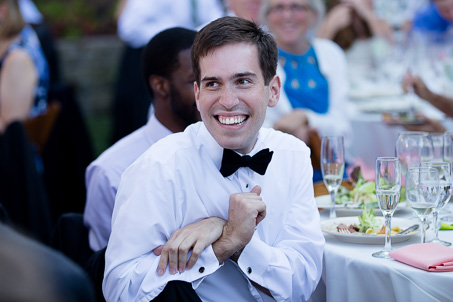 Wedding guest smiling