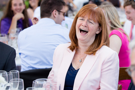 Wedding guest laughing