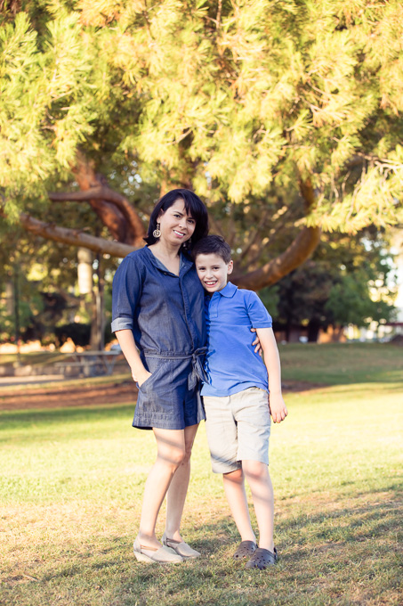 mother and son at a park in the afternoon sun