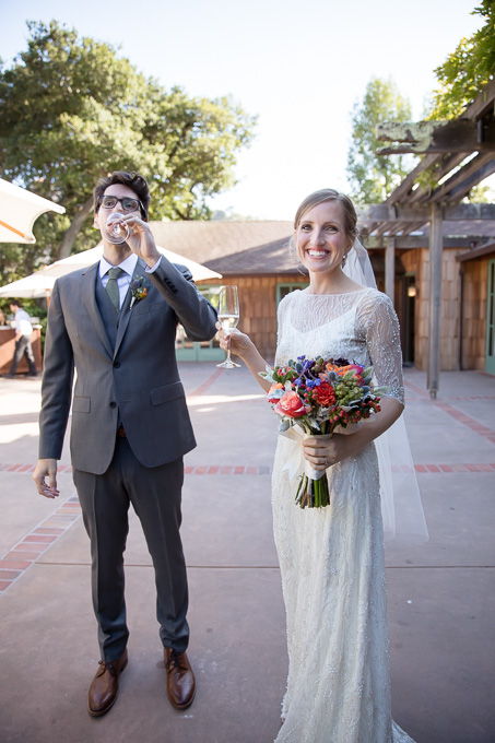 It's official! Bride and Groom cheering after the ceremony