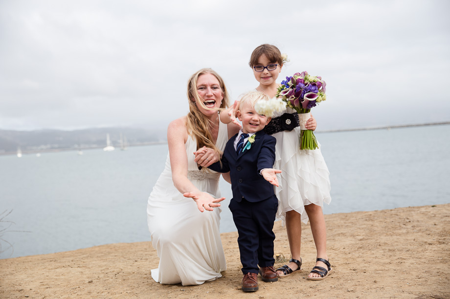 bouquet toss to the happy little ring bearer