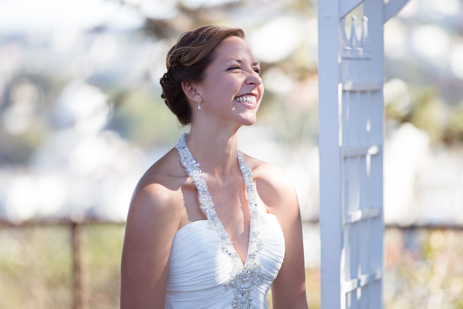 bride smiling at her groom