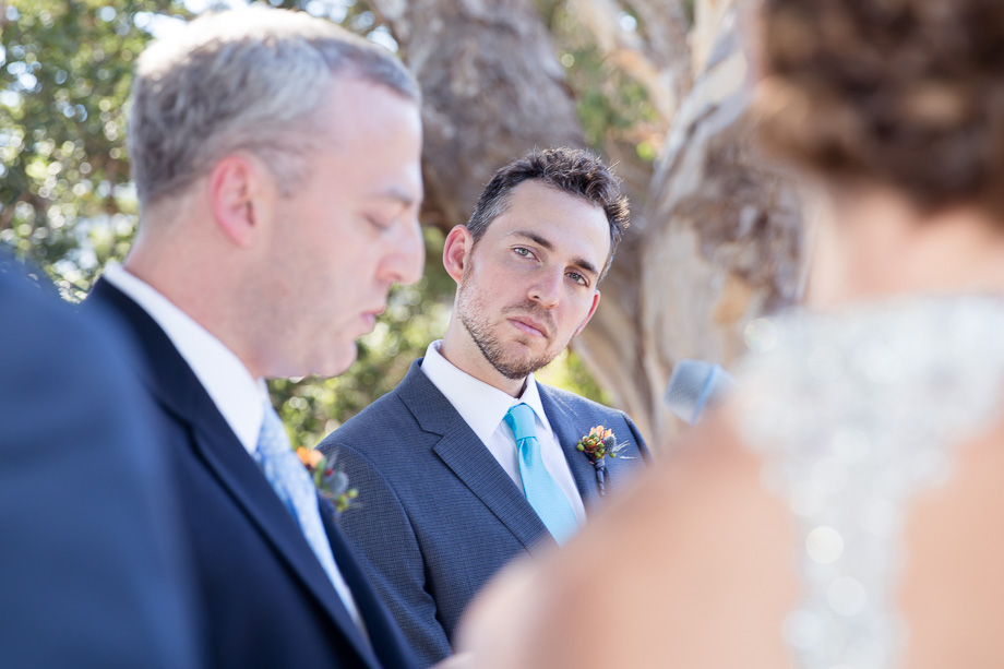 The groom during blessing at his wedding ceremony