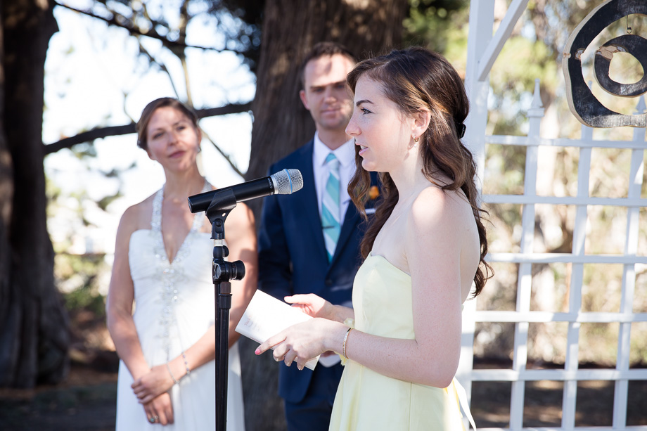 Grooms sister giving blessing to the newlyweds