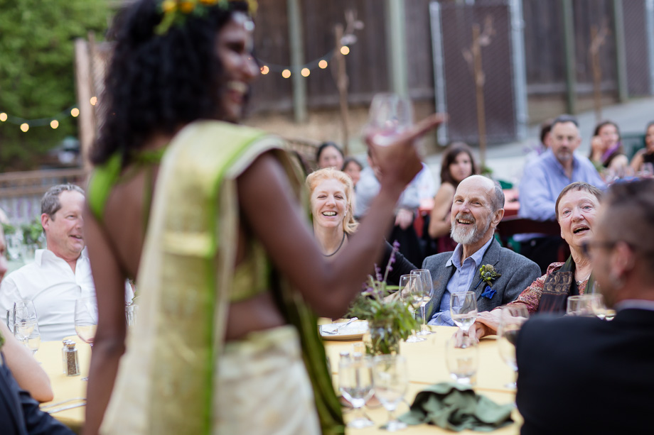 bride giving a speech thanking all the guests at the wedding
