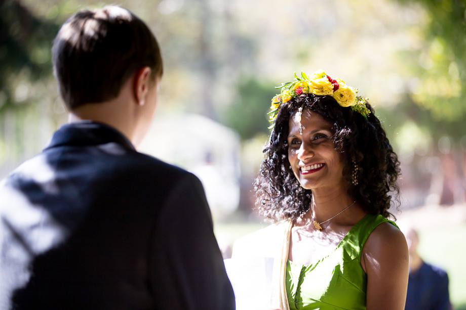 Bride and groom looking at each other during wedding ceremony