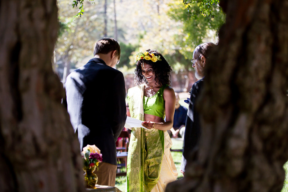 Bride reading her vows to groom at wedding ceremony