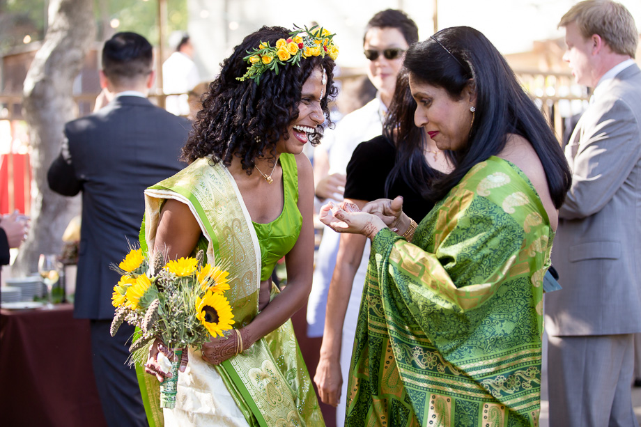 Bride enjoying conversation with guests