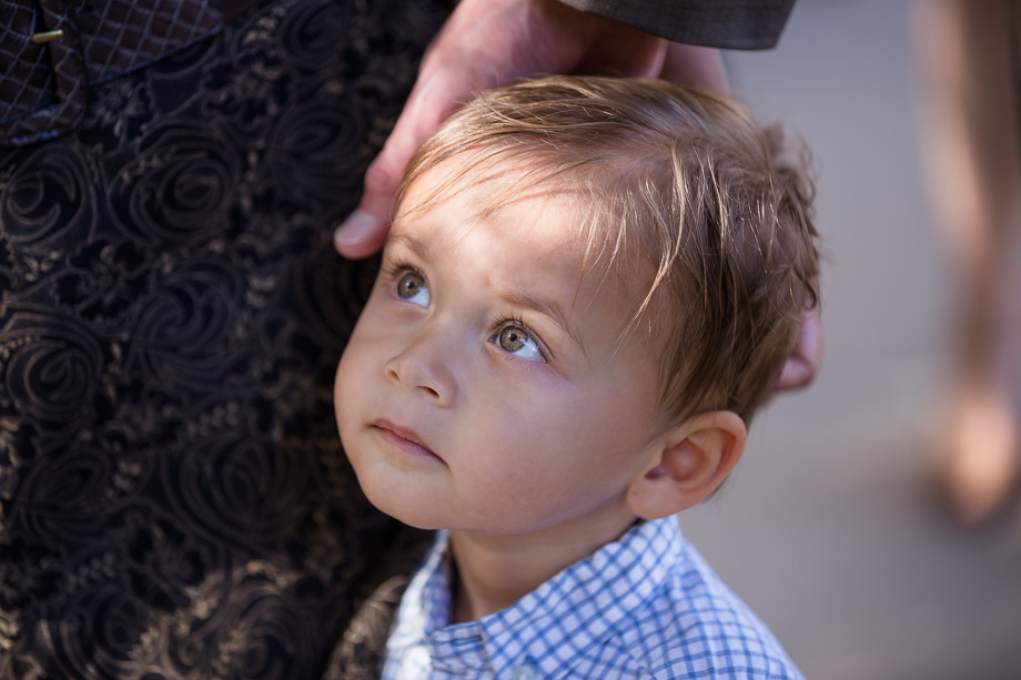 young wedding guest looking up
