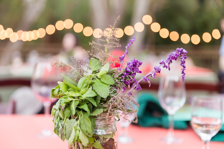 Centerpiece for a guest table, love the hanging cafe sting lights!