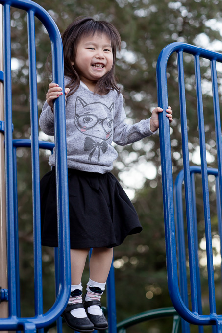 Kaitlyn jumping on the playground