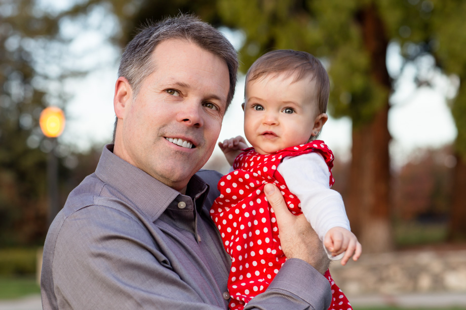Xmas family photo - happy baby girl with her handsome dad