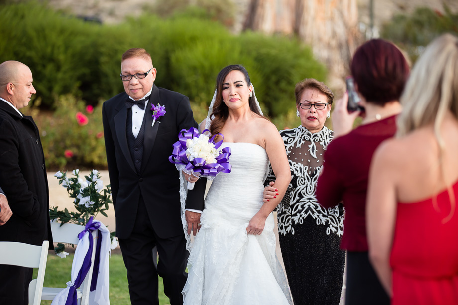 Emotional bride crying when walking down the aisle at the Boundary Oak Golf Club