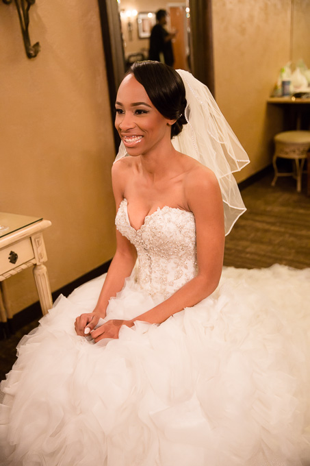 Beautiful bride chatting wth family right before the ceremony at Casa Real - ruby hill real wedding