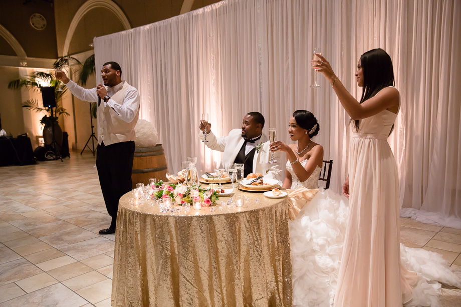Best man and maid of honor giving toasts
