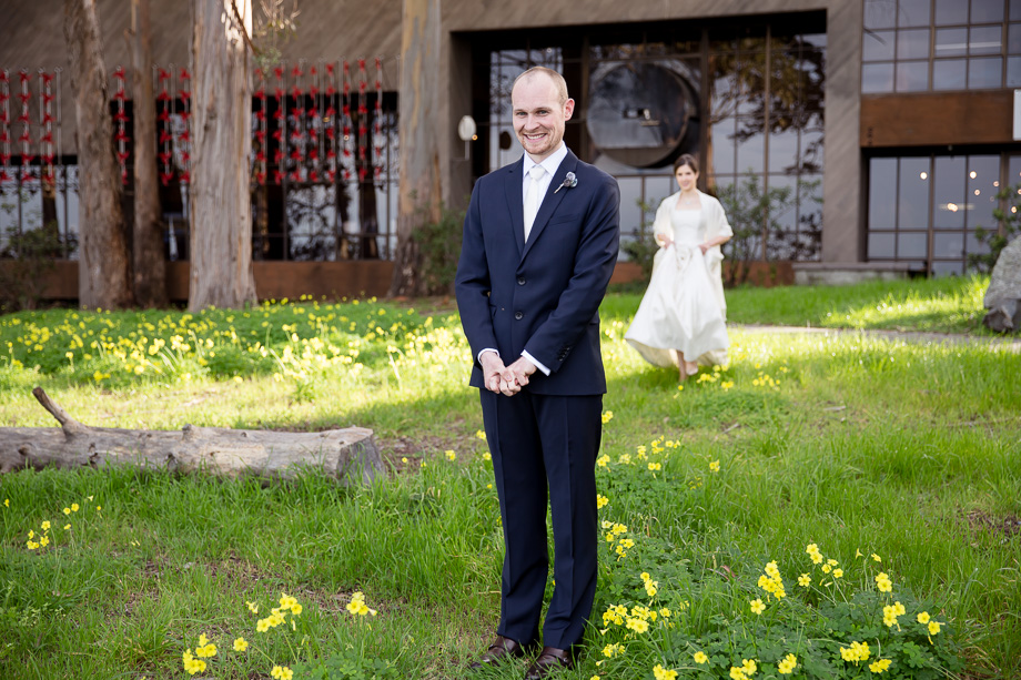 the nervous groom during the emotional first look outside CuriOdyssey