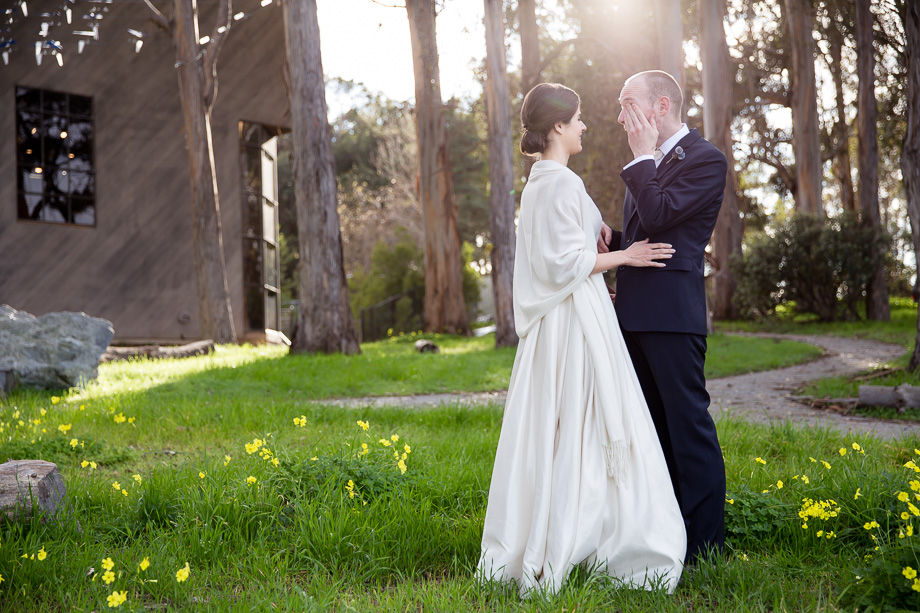 CuriOdyssey wedding - groom wiping his tear when seeing the bride for the first time on their wedding day