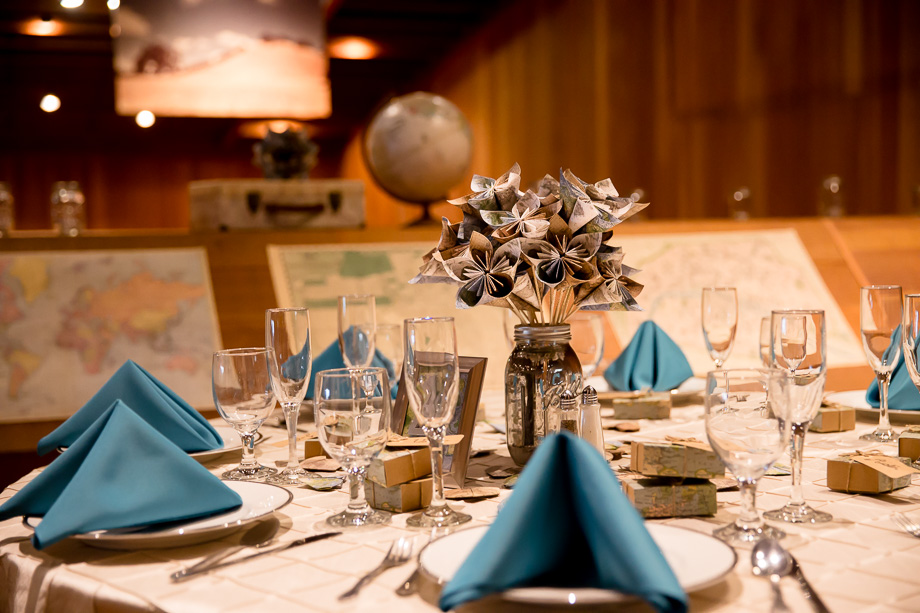beautiful blue and white reception setup at CuriOdyssey museum - modern travel themed