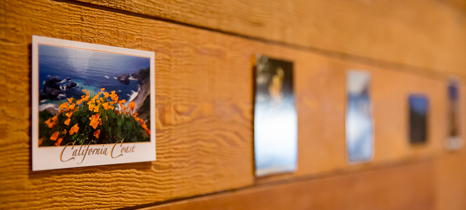 travel themed wedding decor - postcards collected from all over the world