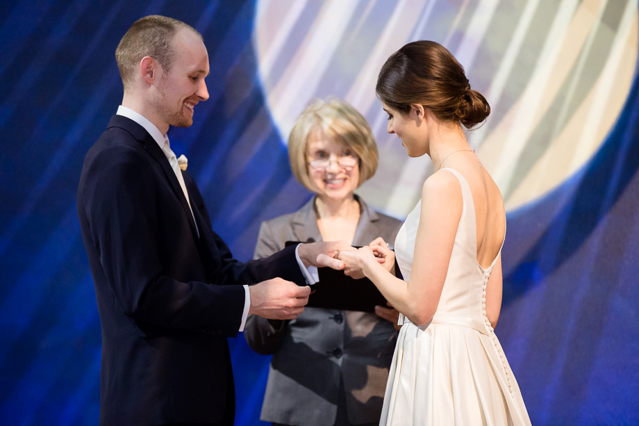sweet couple exchanging rings at the ceremony