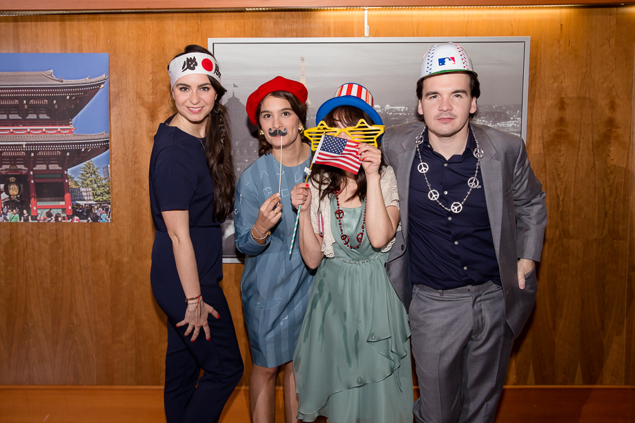Wedding guests at a DIY photobooth for a fun group photo at CuriOdyssey