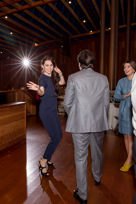 guests dancing at the modern travel themed wedding reception