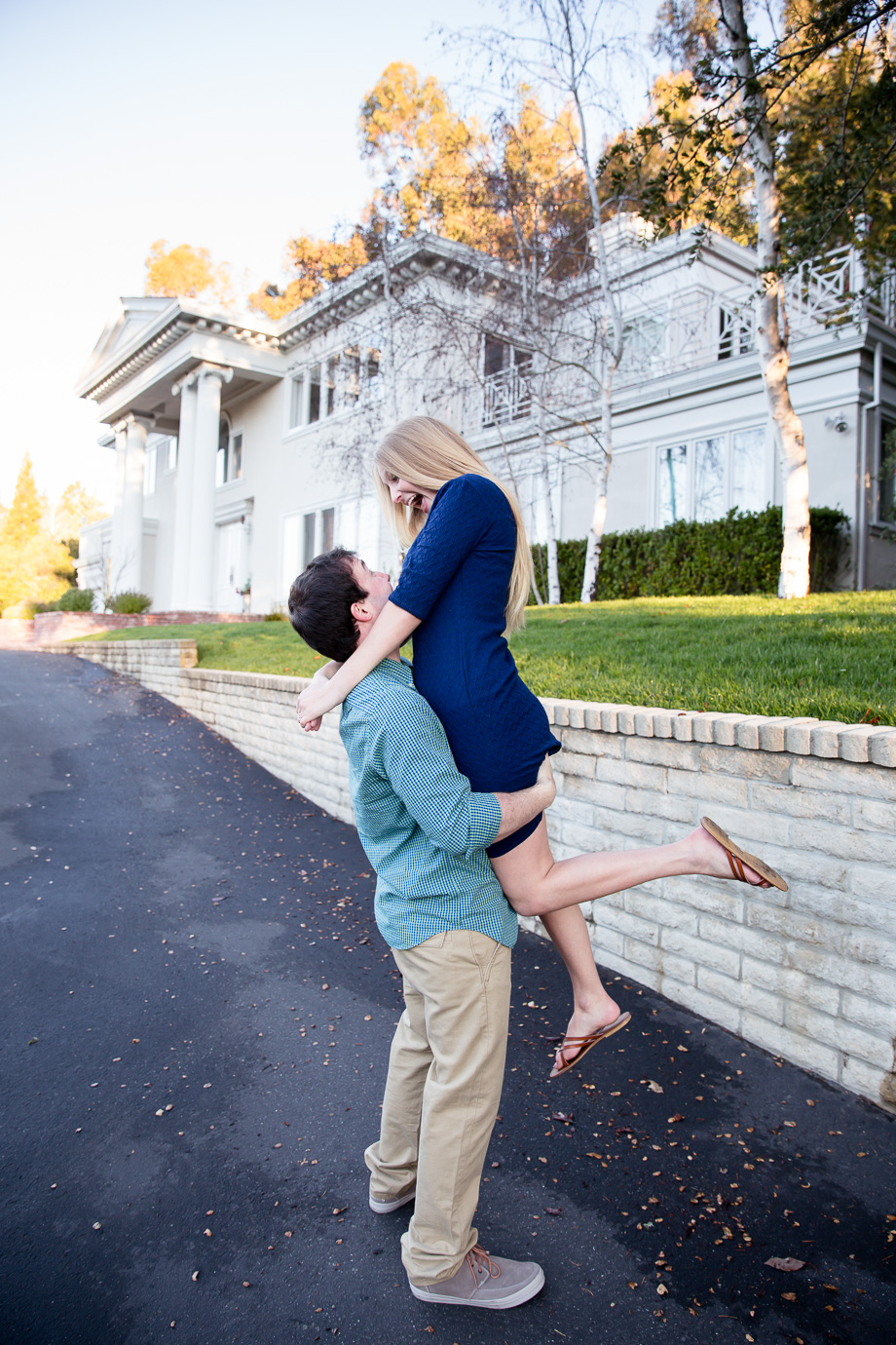 playful engagement photo taken in menlo park - the happist couple is having their wedding at Monarch Cove Inn this October
