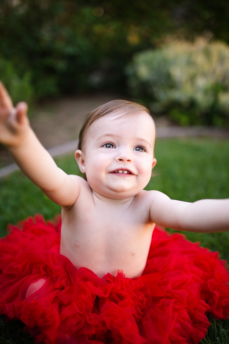 birthday girl is excited about her first cake