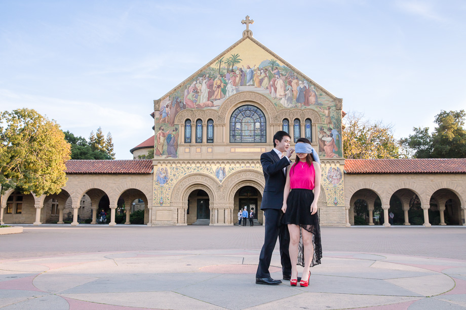 taking off blindfold in front of Stanford Memorial Church for surprise proposal
