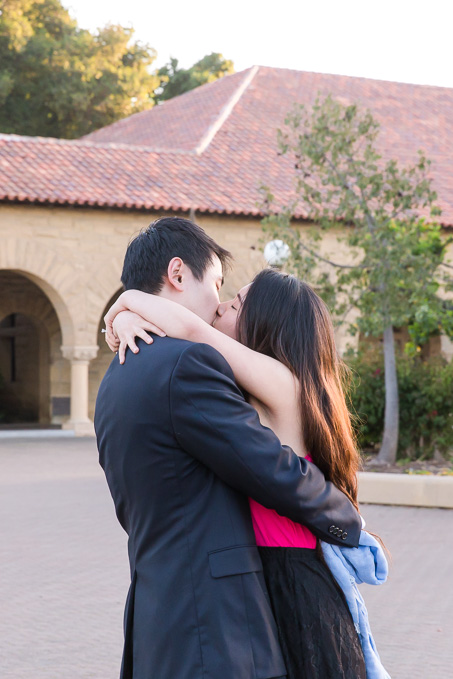 an emotional kiss after he surprised her with a proposal and she said yes