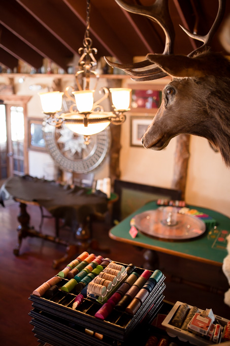 inside the bar of long branch saloon and farms