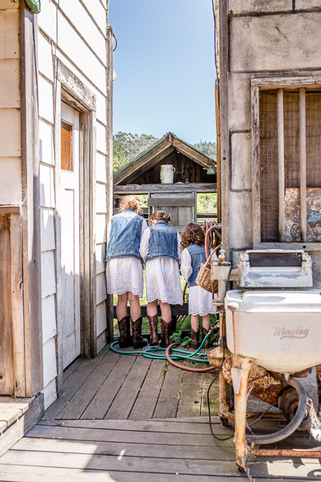 flower girls at a rustic barn wedding