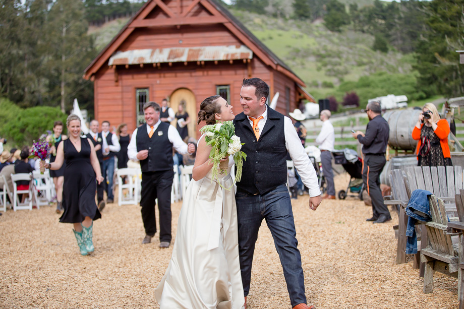 newlyweds walking down the aisle