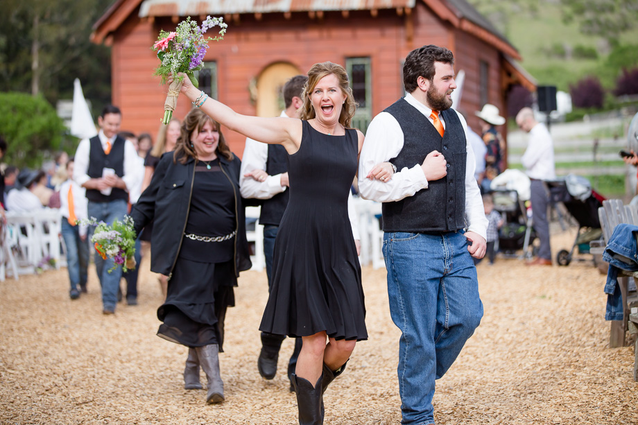 bridal party dancing down the aisle