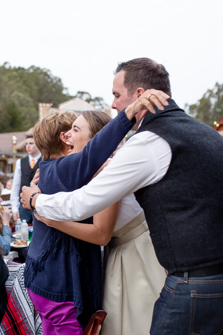 newlyweds excitedly greeting their guest