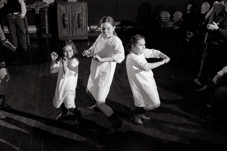 flower girls dancing at the reception