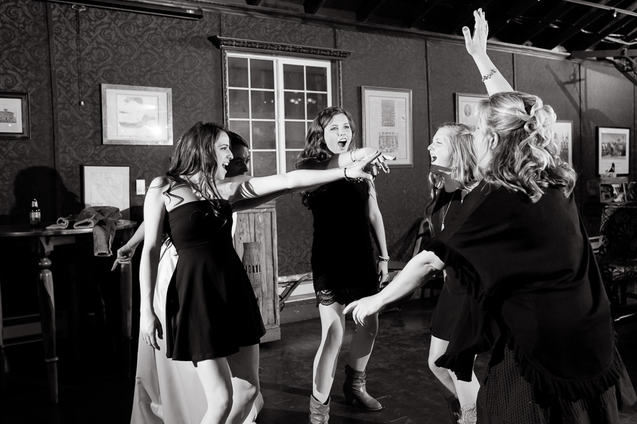 pretty junior bridesmaid dancing with the bride