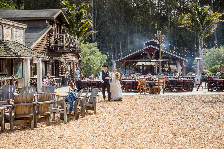 bride walking down the aisle with her dad