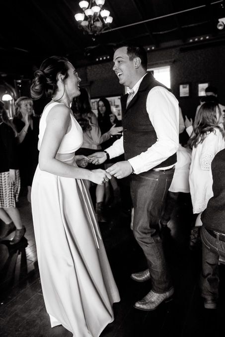 happy couple dancing at their wedding reception