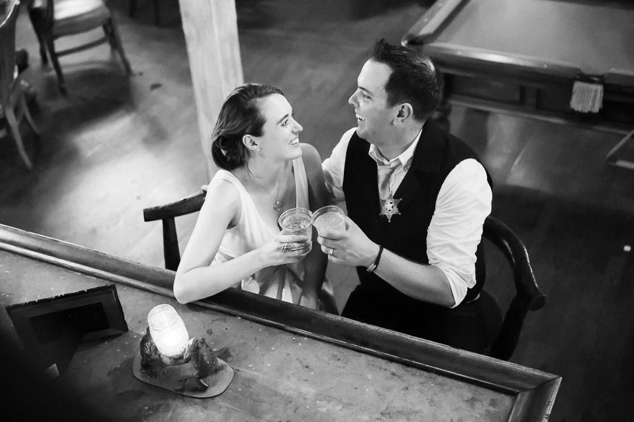bride and groom intimate photo at the bar at long branch saloon and farms