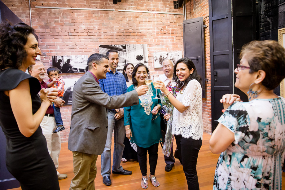 celebrating their engagement with family and friends