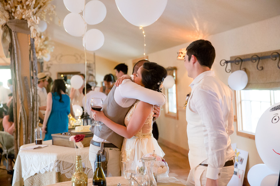 a hug with the groomsman