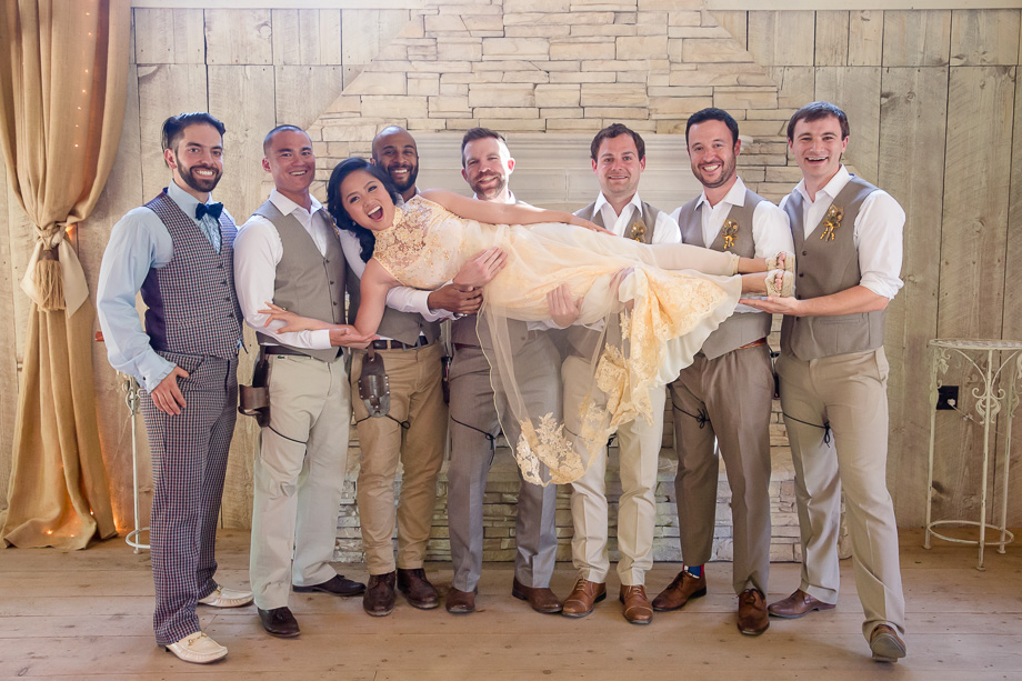 bride with groomsmen photo