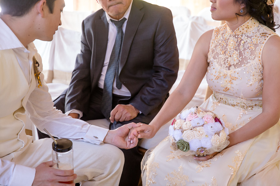 newlyweds chatting with dad