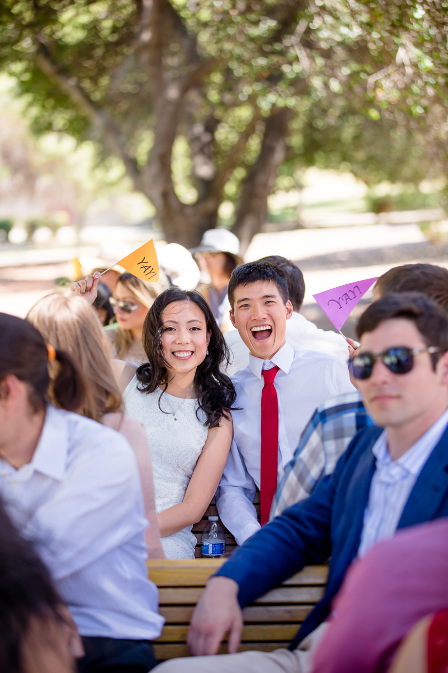 bride and groom enjoying the train ride with their wedding guests at Vasona Lake County Park, Los Gatos
