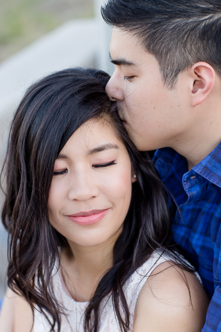 intimate close up kissing on the forehead shot