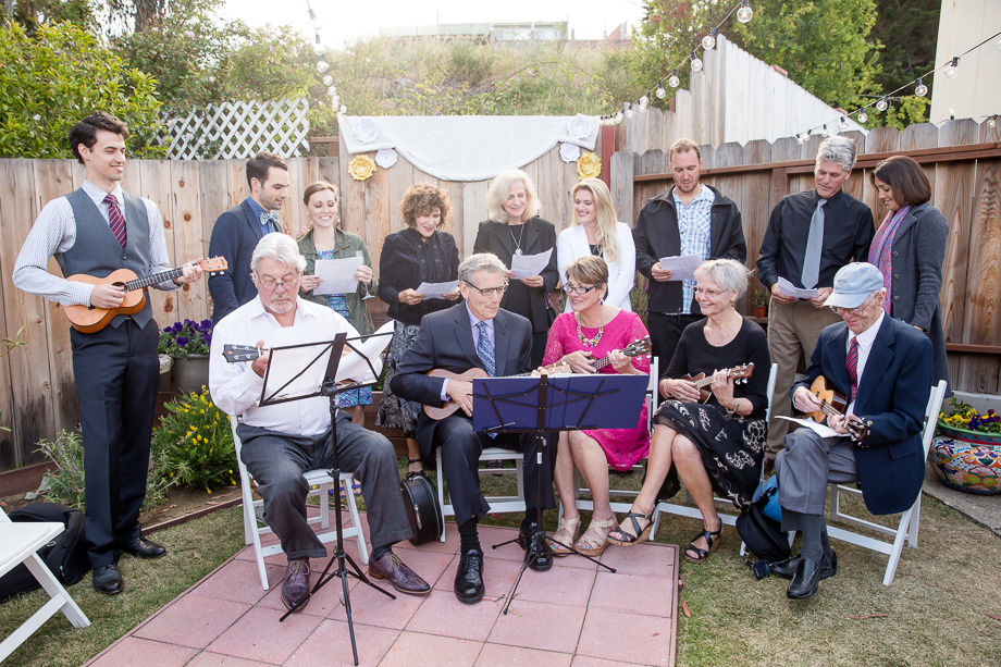 grooms family giving the newlyweds a surprise performance