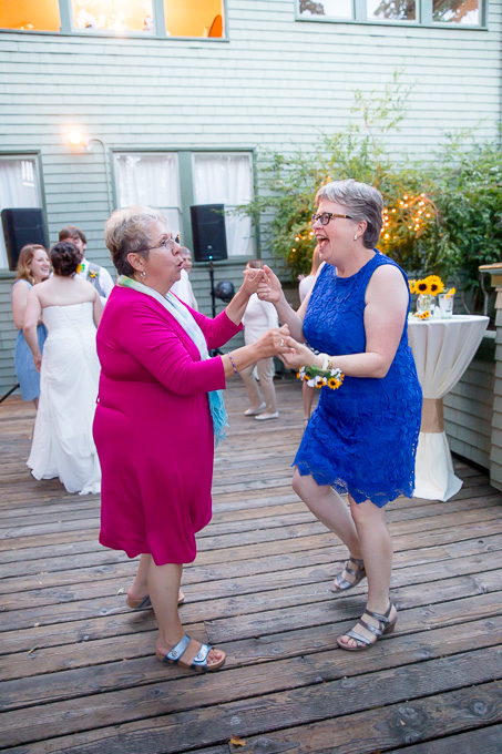 grooms mother dancing at the patio