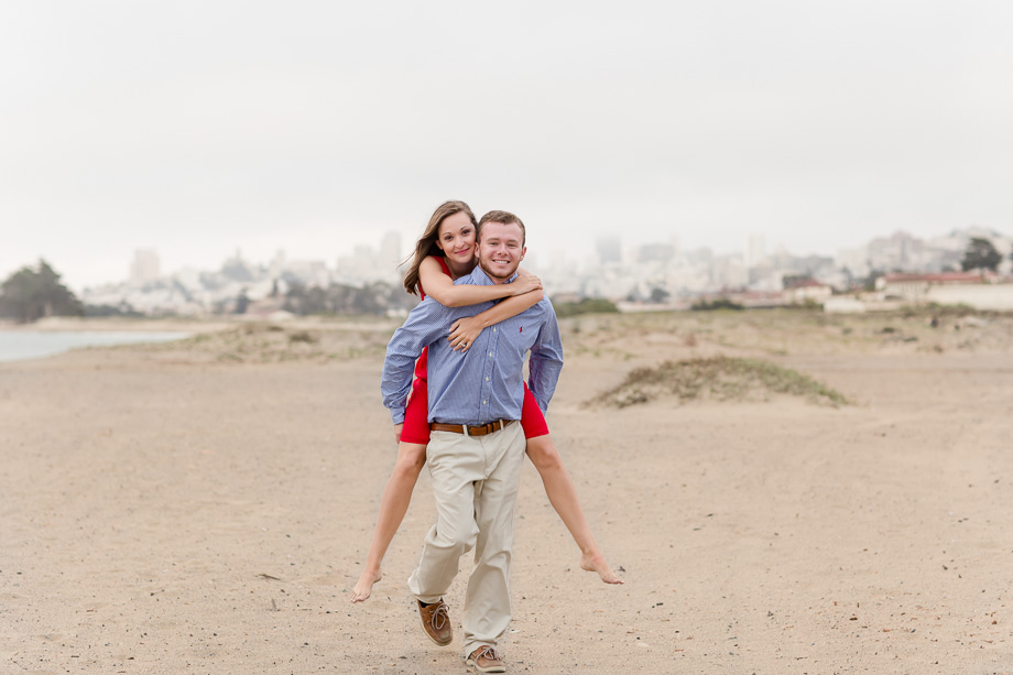 engagement photo - beach and San Francisco skyline